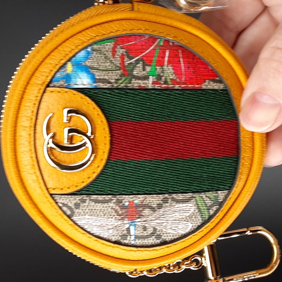 GUCCI GG FLORA OPHIDIA COIN PURSE in YELLOW .